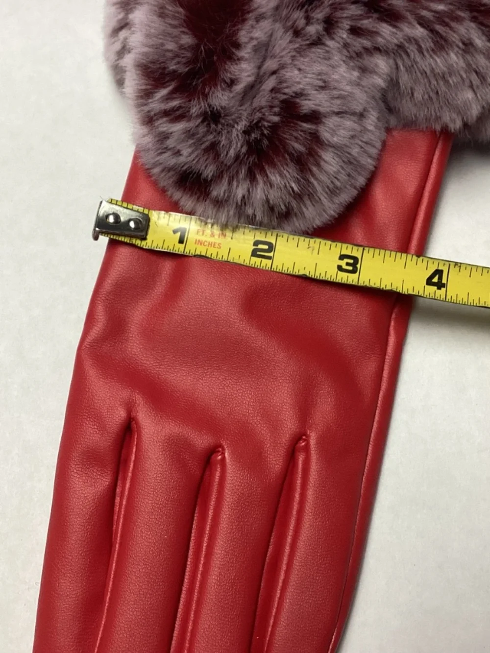 Red winter gloves with PURPLE FAUX FUR. really cute. Non leather